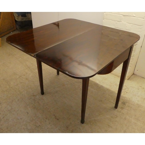 4 - A late Victorian mahogany D-end tea table, the foldover top raised on square, tapered legs  29.... 