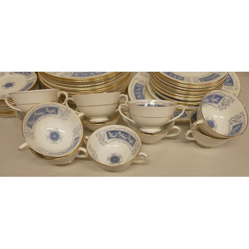 60 - A Coalport china Revelry pattern dinner service: to include a charger  15