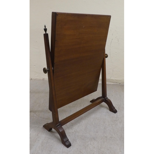 62 - An Edwardian mahogany framed toilet mirror  24