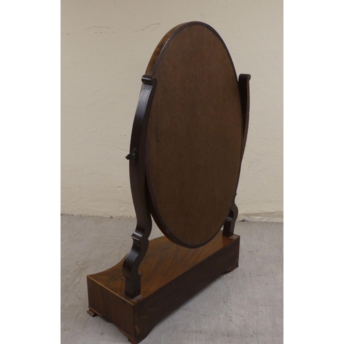 63 - A Regency satinwood inlaid, mahogany serpentine front dressing table mirror with a box section base ... 