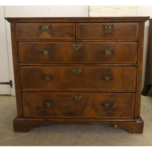 8 - A late 18thC crossbanded and quarter veneered, mahogany five drawer dressing chest, on a plinth and ... 