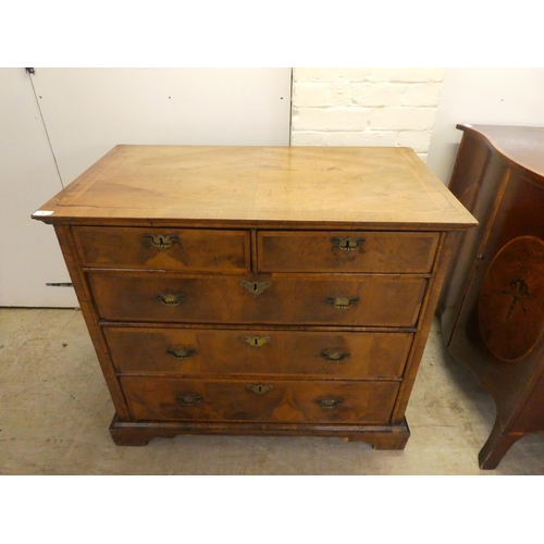 8 - A late 18thC crossbanded and quarter veneered, mahogany five drawer dressing chest, on a plinth and ... 