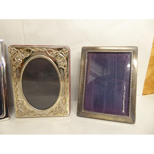 84 - Photograph frames: to include a silver mounted example  bears indistinct marks  8