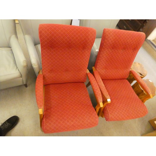 240 - A pair of modern beech framed and red diamond pattern fabric upholstered open armchairs, raised on t... 