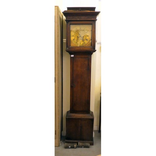 58 - A late 18thC oak longcase clock; the 8 day movement faced by a brass Roman dial with subsidiary seco... 