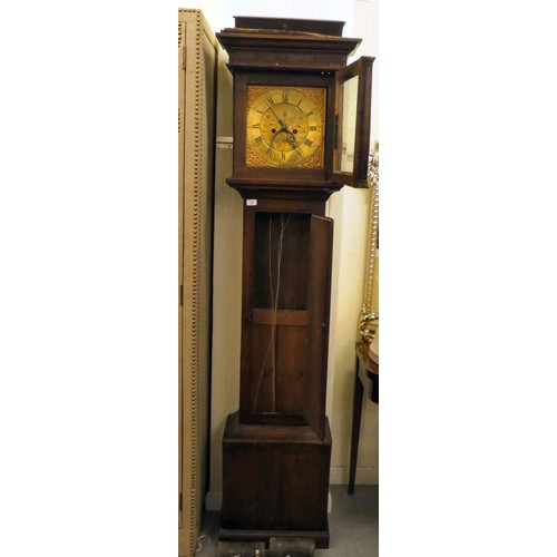 58 - A late 18thC oak longcase clock; the 8 day movement faced by a brass Roman dial with subsidiary seco... 