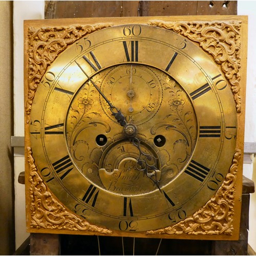 58 - A late 18thC oak longcase clock; the 8 day movement faced by a brass Roman dial with subsidiary seco... 