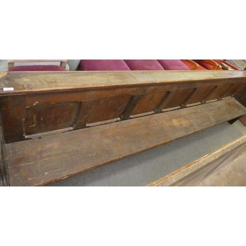 239 - A late 19th/early 20thC stained pine church pew  132