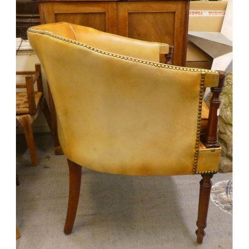 255 - A modern Georgian design, round back,  mahogany framed chair, stud upholstered in tan coloured hide,... 