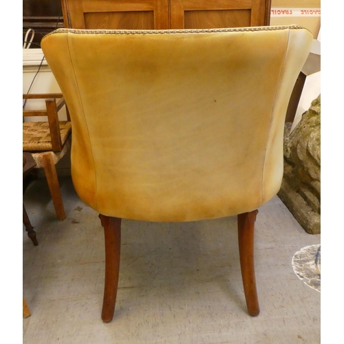 255 - A modern Georgian design, round back,  mahogany framed chair, stud upholstered in tan coloured hide,... 