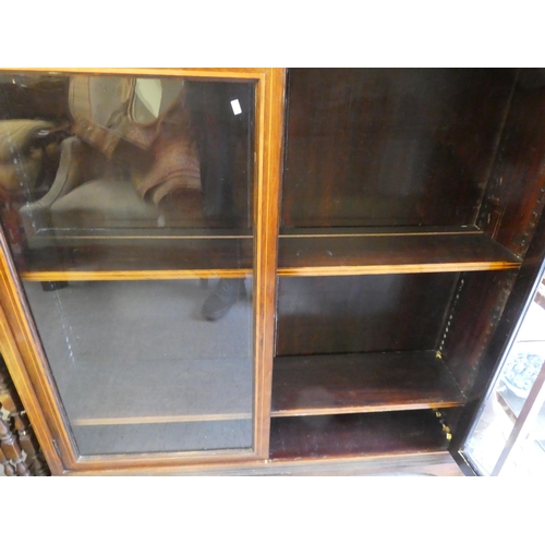 48 - An Edwardian satinwood inlaid rosewood cabinet with two glazed doors, on a plinth  51