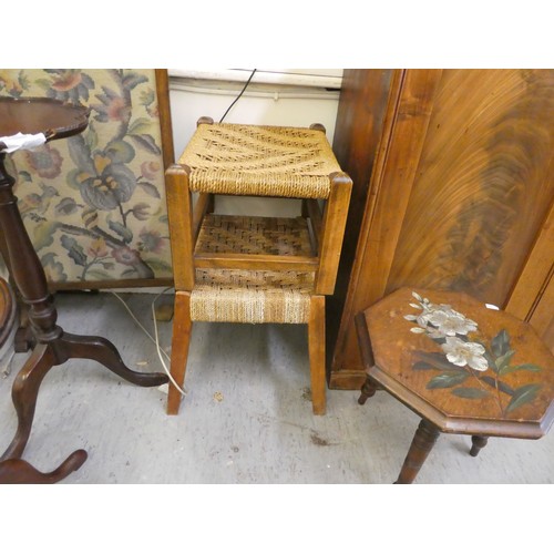 210 - Small 20thC brown furniture: to include two similar Georgian design wine tables  22