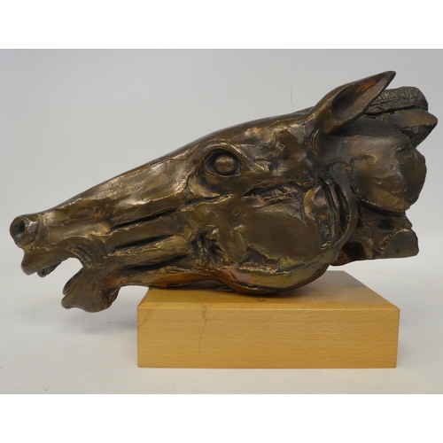 10 - A gilded metal, bronze finished sculpture, a horses' head, on a polished beech plinth  9