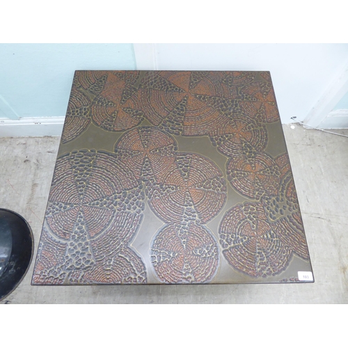 103 - A 1980s teak coffee table with a simulated faux pottery effect, textured patterned top  19