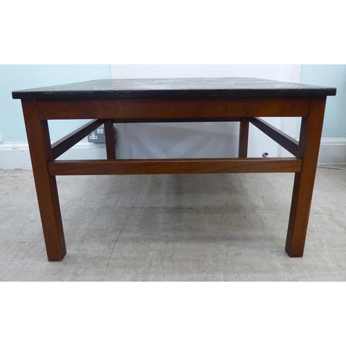 103 - A 1980s teak coffee table with a simulated faux pottery effect, textured patterned top  19