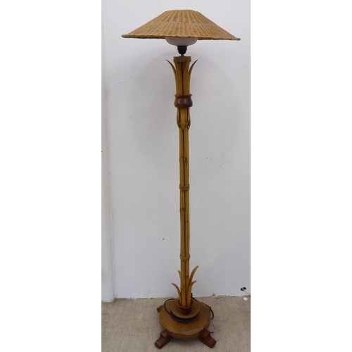 111 - A modern standard lamp, made from oak and bamboo, fashioned as a tree  58