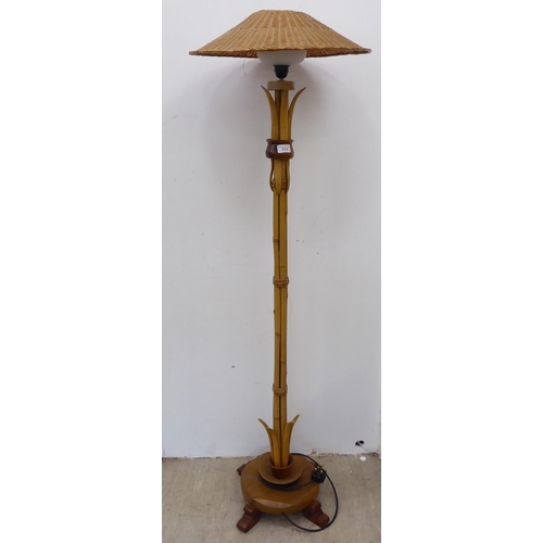 111 - A modern standard lamp, made from oak and bamboo, fashioned as a tree  58