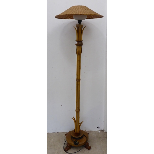 111 - A modern standard lamp, made from oak and bamboo, fashioned as a tree  58