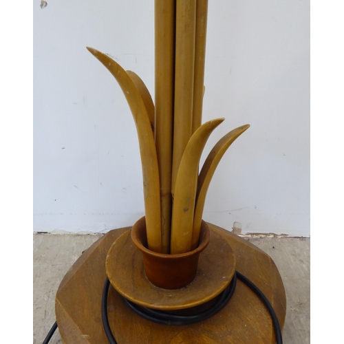 111 - A modern standard lamp, made from oak and bamboo, fashioned as a tree  58