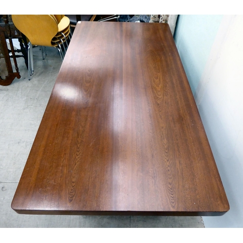 115 - A circa 1960/70s teak one-piece desk with two drawers, raised on two lozenge shaped pedestals  31