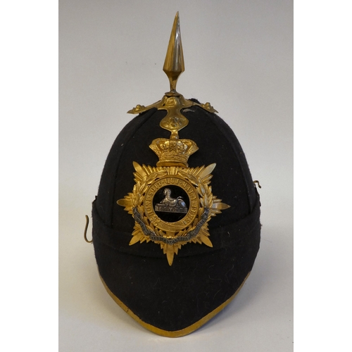 120 - An early 20thC design East Lancashire Regiment Home Service helmet(Please Note: this lot is subject ... 