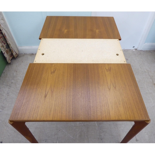 121 - A circa 1960s Henning Kjaernulf for Vejle Stole & Mobeljubrik teak dining table with two draw le... 