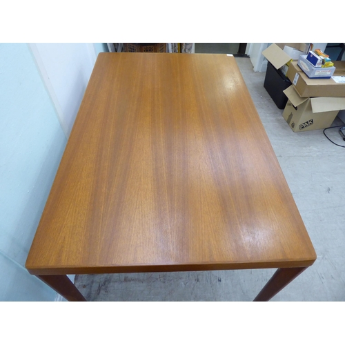 121 - A circa 1960s Henning Kjaernulf for Vejle Stole & Mobeljubrik teak dining table with two draw le... 