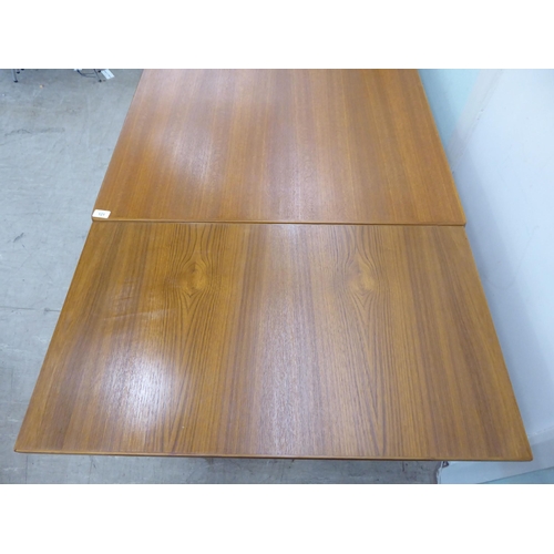 121 - A circa 1960s Henning Kjaernulf for Vejle Stole & Mobeljubrik teak dining table with two draw le... 