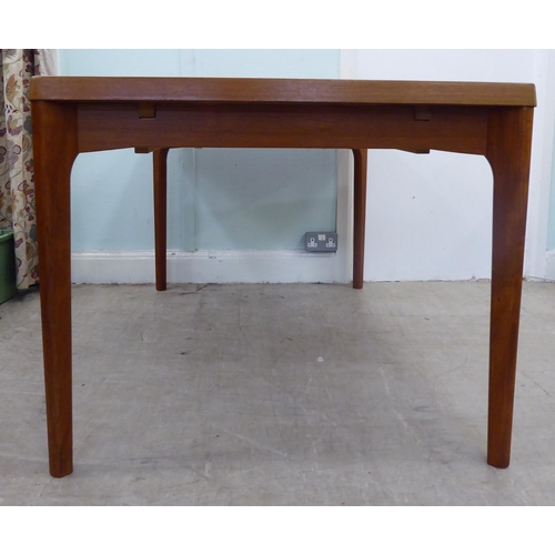 121 - A circa 1960s Henning Kjaernulf for Vejle Stole & Mobeljubrik teak dining table with two draw le... 