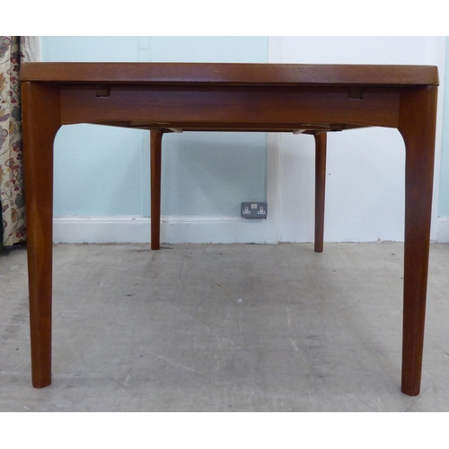 121 - A circa 1960s Henning Kjaernulf for Vejle Stole & Mobeljubrik teak dining table with two draw le... 