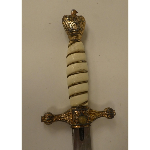 124 - A German World War II era naval dagger with a wire bound celluloid grip, the blade inscribed 'Alcosa... 