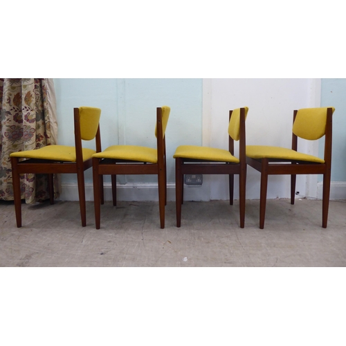 125 - A set of four Finn Juhl for France & Son, Danish teak framed and fabric upholstered dining chair... 