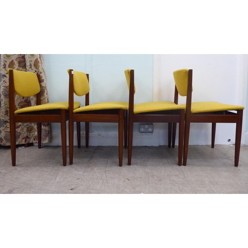 125 - A set of four Finn Juhl for France & Son, Danish teak framed and fabric upholstered dining chair... 