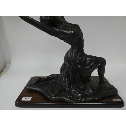 134 - A modern bronze effect moulded resin figure, a female ballet dancer  17