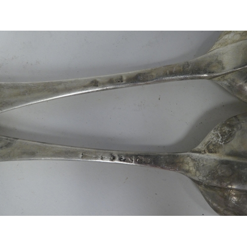 137 - A pair of (probably 18thC) silver Old English pattern tablespoons  marks rubbed  (approx. 4.3ozs)