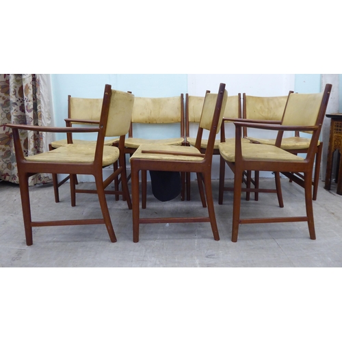 139 - A set of seven circa 1970s Kai Lyngfeldt Larsen teak framed and hide upholstered dining chairs, rais... 