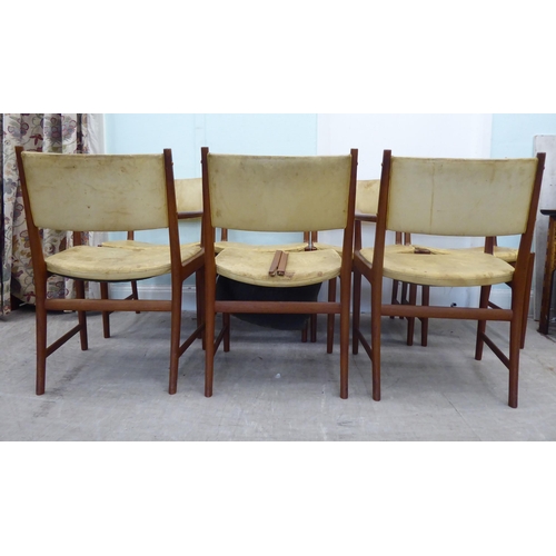 139 - A set of seven circa 1970s Kai Lyngfeldt Larsen teak framed and hide upholstered dining chairs, rais... 