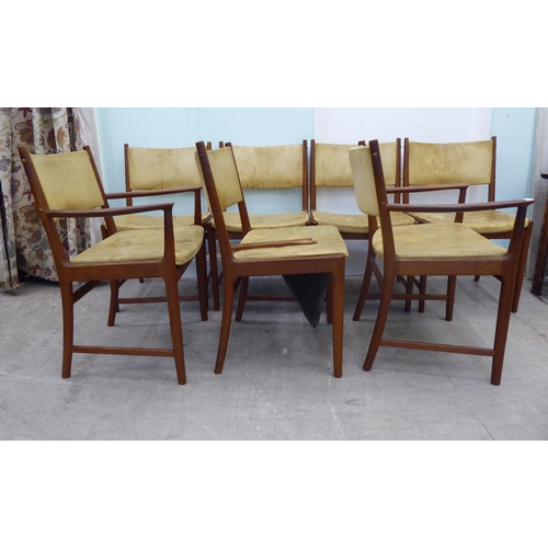 139 - A set of seven circa 1970s Kai Lyngfeldt Larsen teak framed and hide upholstered dining chairs, rais... 