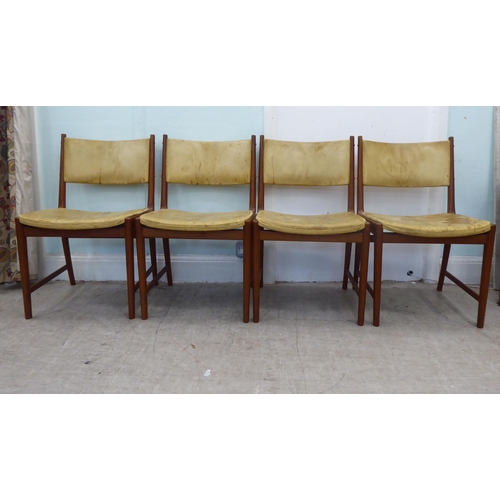 139 - A set of seven circa 1970s Kai Lyngfeldt Larsen teak framed and hide upholstered dining chairs, rais... 