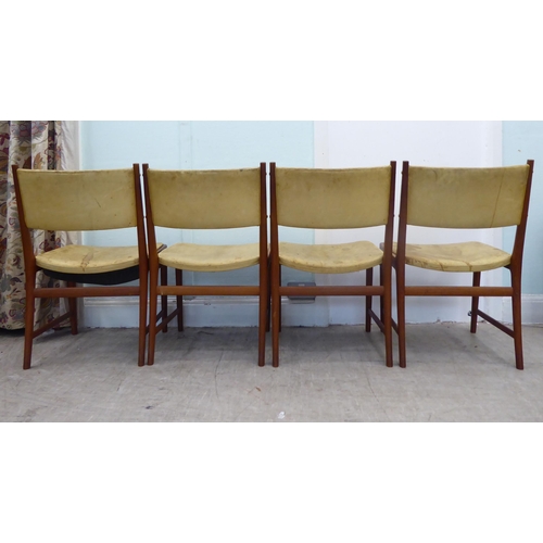 139 - A set of seven circa 1970s Kai Lyngfeldt Larsen teak framed and hide upholstered dining chairs, rais... 