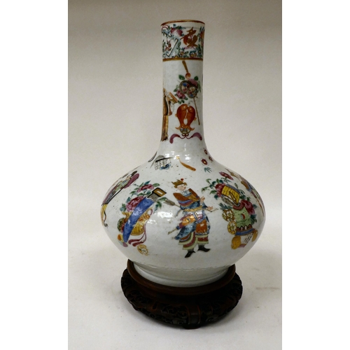 154 - A 19thC Chinese porcelain bottle vase of squat, bulbous form with a long, narrow neck, decorated wit... 