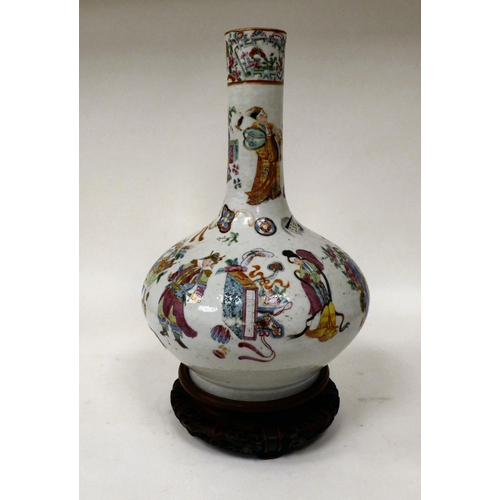 154 - A 19thC Chinese porcelain bottle vase of squat, bulbous form with a long, narrow neck, decorated wit... 