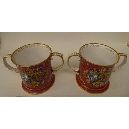 164 - Two Spode china twin handled loving cups, celebrating the Silver Wedding Anniversary of the Queen an... 