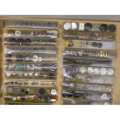 170 - A collection of silver mother-of-pearl brass and other variously themed buttons