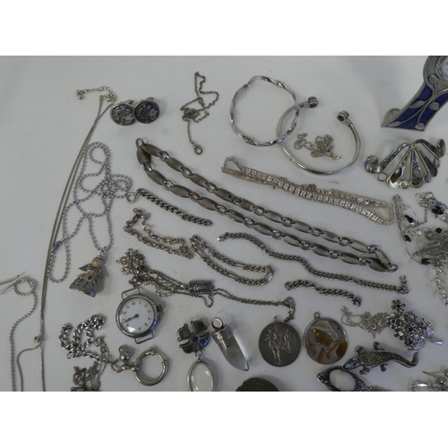 175 - White metal and other costume jewellery: to include brooches