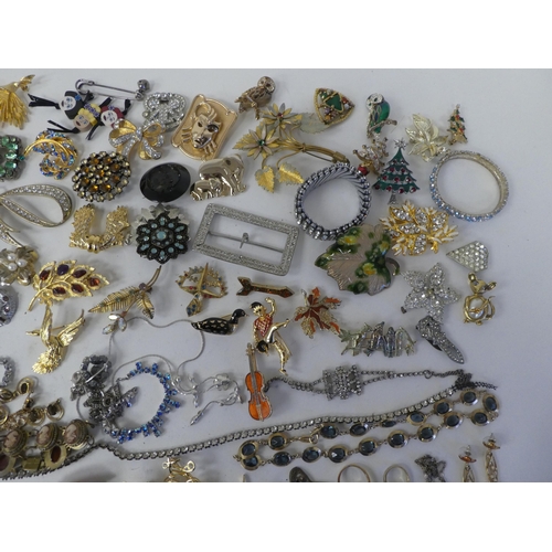 184 - Costume jewellery, mainly brooches, set with coloured stones