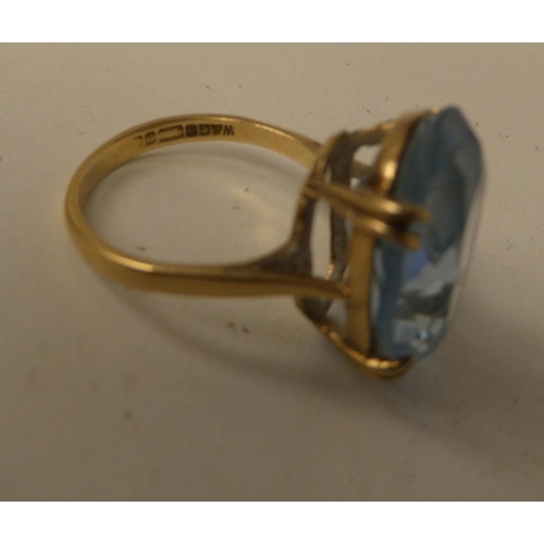 186 - Two dissimilar rings, set with aquamarine coloured stones