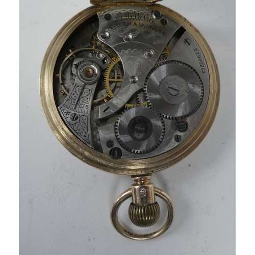 188 - A Waltham 9ct gold cased pocket watch; the movement faced by a Roman dial with subsidiary seconds an... 