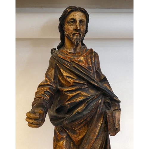 20 - An 18th/19thC carved wooden and polychrome standing biblical figure, on an integral plinth  23