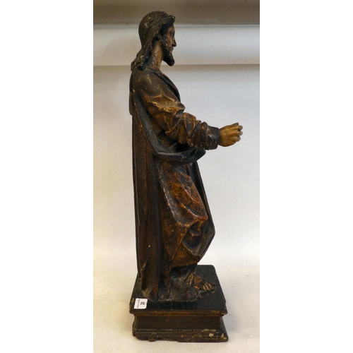 20 - An 18th/19thC carved wooden and polychrome standing biblical figure, on an integral plinth  23